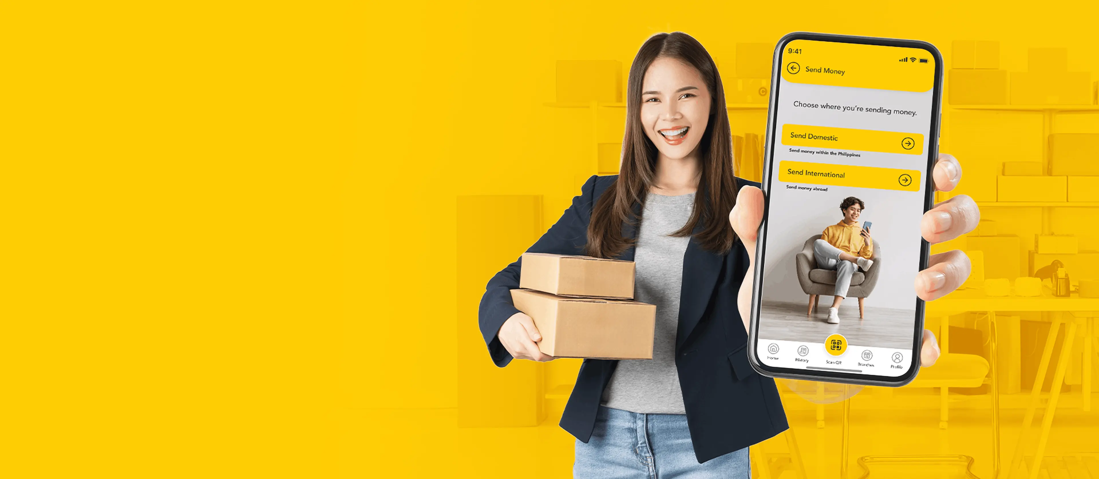 A businesswoman holding packages with a smartphone showing the U Mobile App interface for commercial outbound transfers.