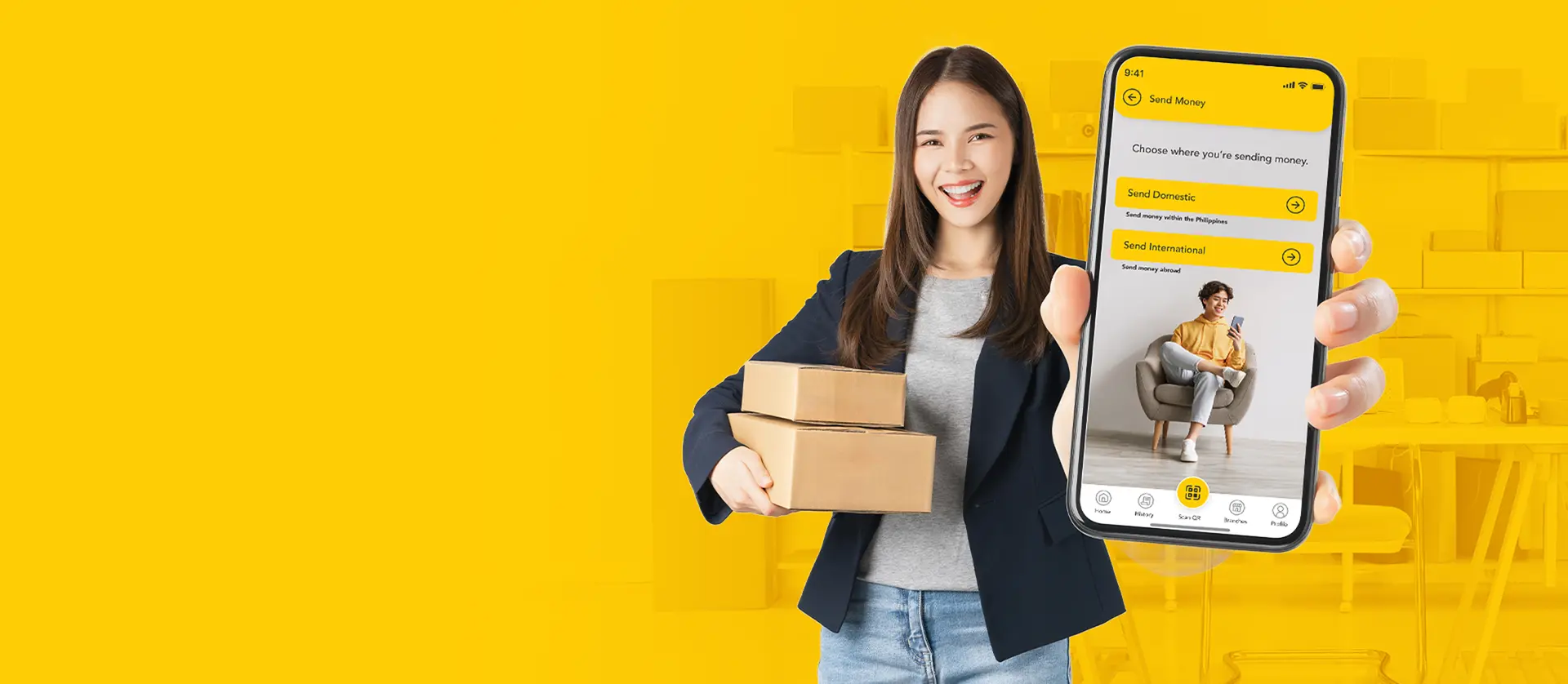 A businesswoman holding packages with a smartphone showing the U Mobile App interface for commercial outbound transfers.