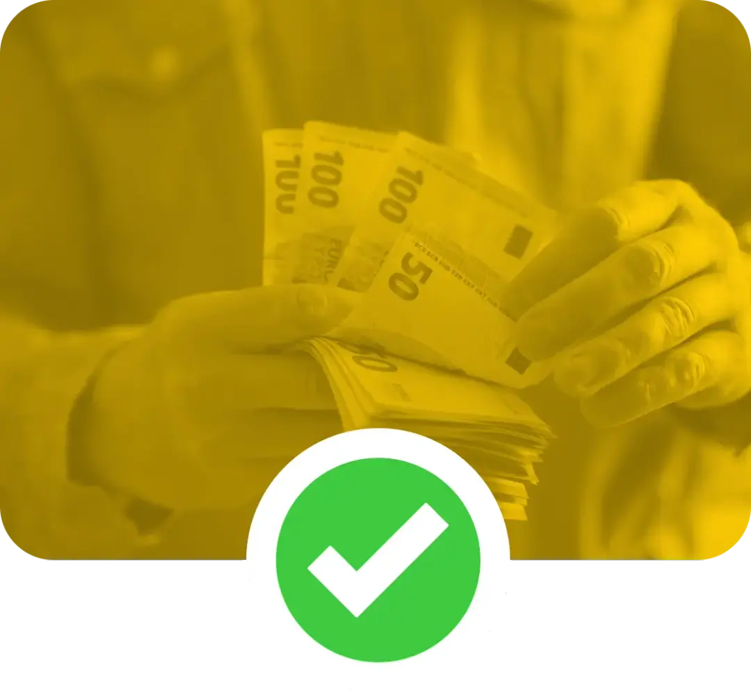 Image of a smiling professional woman, with her left arm raised in triump.