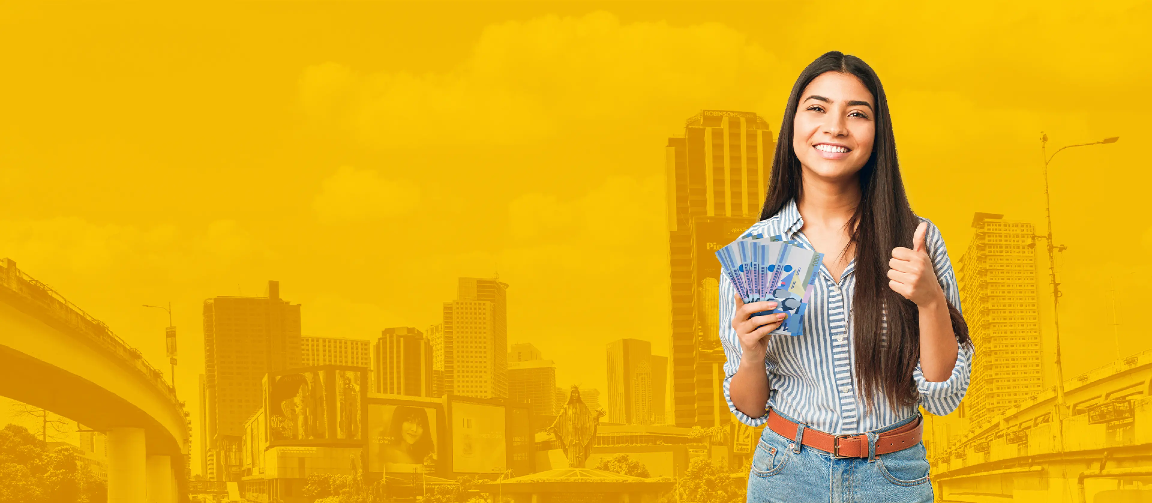 A young woman holding several PHP 1,000 in cash in her right hand while making an OK sign with her left hand